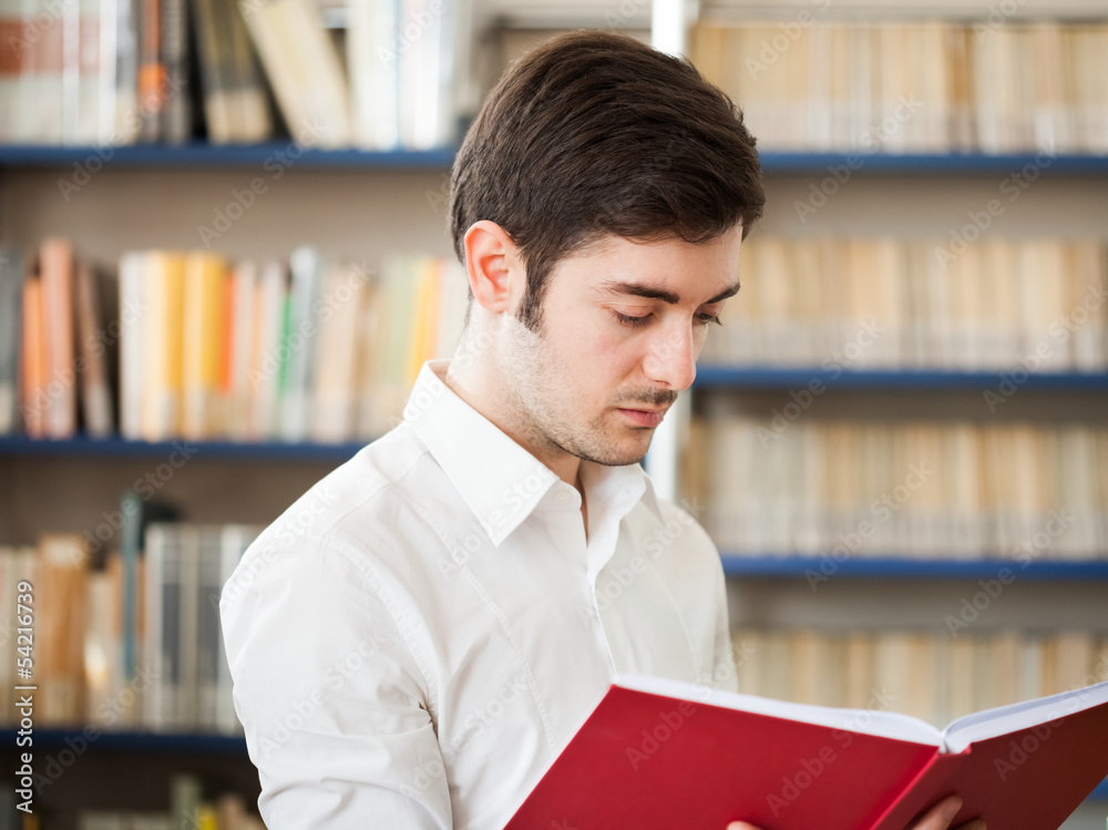 Guy reading a book Guy reading a book