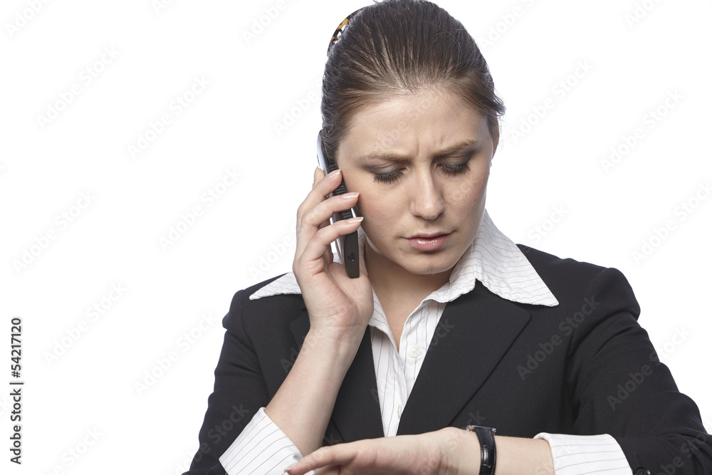 Businessfrau telefoniert unter Zeitdruck Businessfrau telefoniert unter Zeitdruck