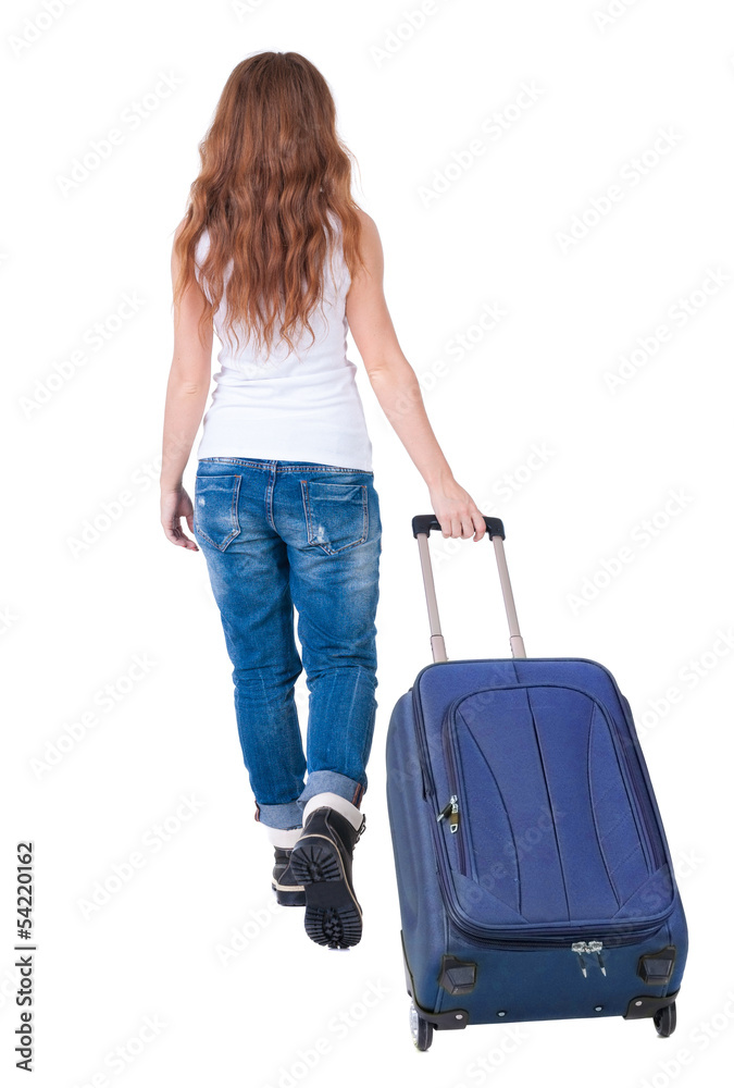 back view of walking woman with suitcase back view of walking woman with suitcase