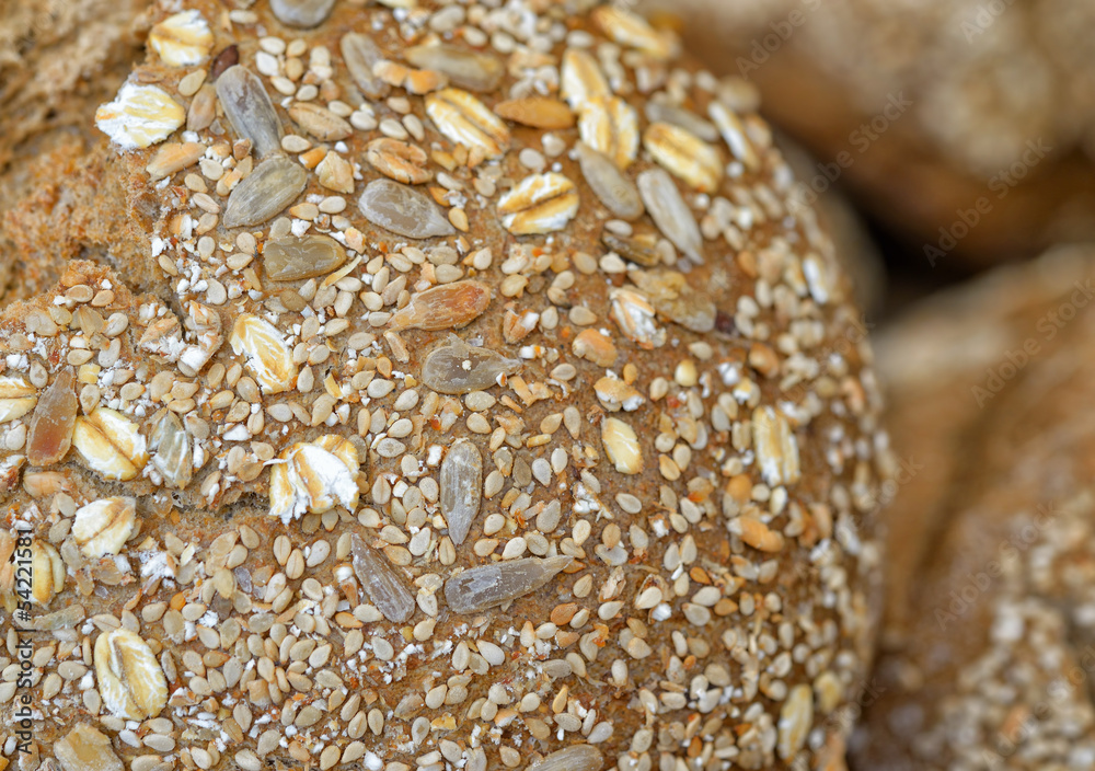 Fresh organic whole grain bread closeup image Fresh organic whole grain bread closeup image
