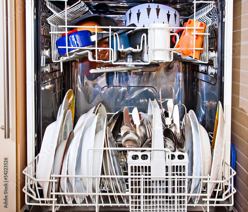 modern home dishwashing machine appliance showing open photo