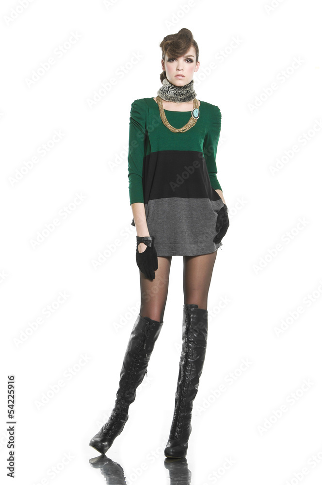 image of young fashion model in gloves posing in studio image of young fashion model in gloves posing in studio
