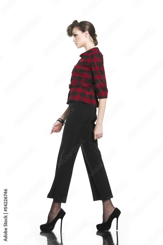 Full body beautiful fashion casual girl walking in studio Full body beautiful fashion casual girl walking in studio