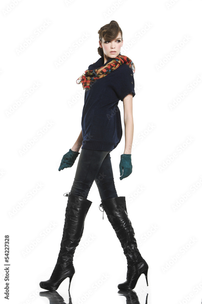 full body fashion woman with gloves walking in studio full body fashion woman with gloves walking in studio