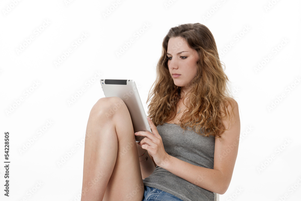 girl worried with tablet..