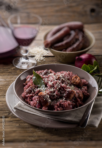 risotto with red wine and sausage, selective focus