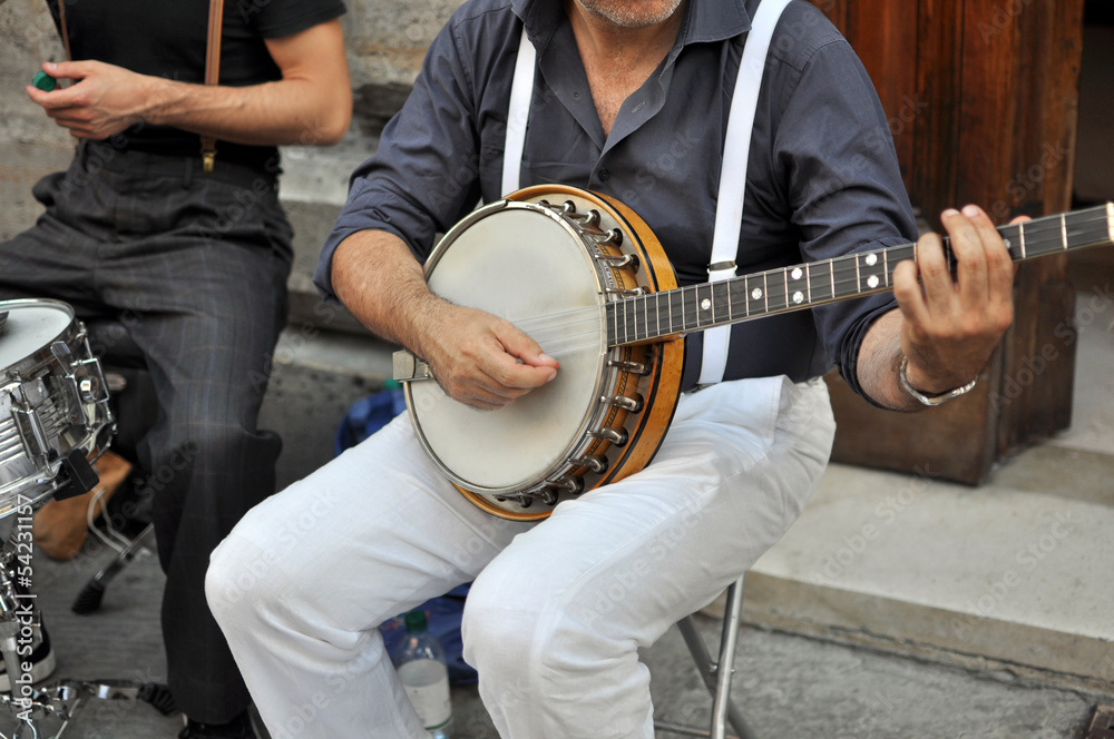 Fototapeta Artista di strada con banjo