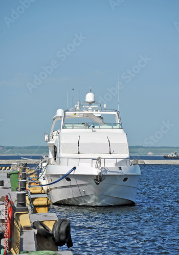 White motor yacht over harbor pier  Odessa  Ukraine