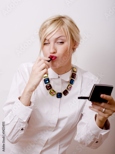 young pretty blonde girl presenting jewelry fashion at white copy space