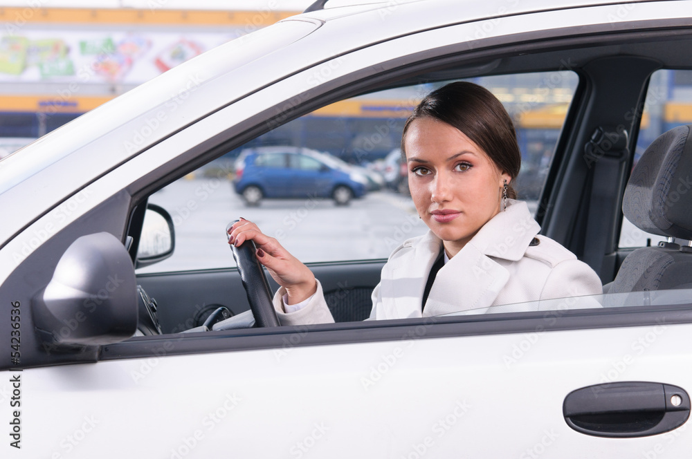 business woman in a car