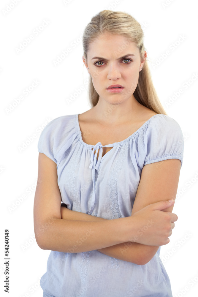 Outraged blonde woman with arms crossed Outraged blonde woman with arms crossed