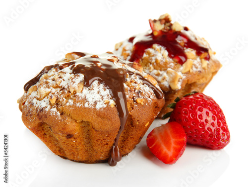Tasty muffin cakes with strawberries and chocolate, isolated