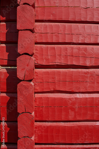 Red, hand carved log wall, corner joint, texture material.