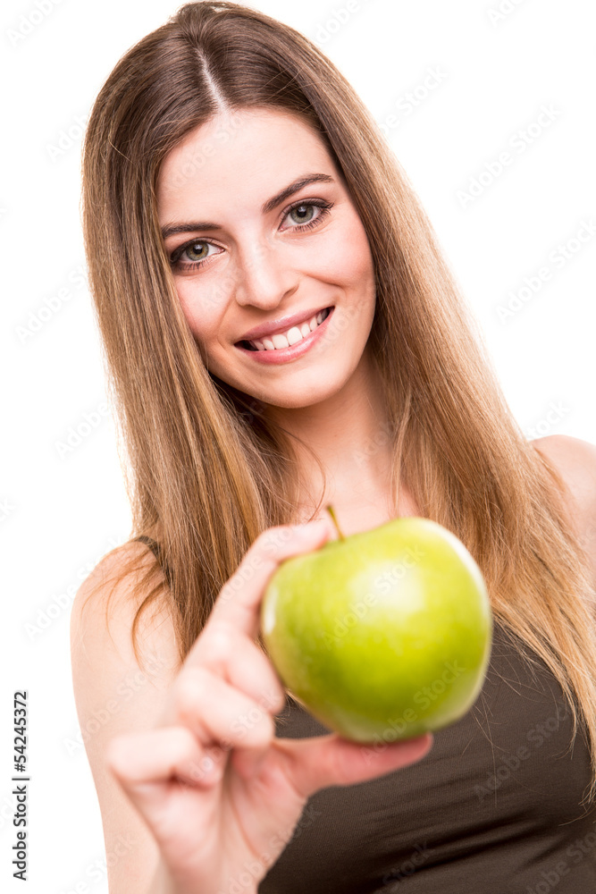 Portrait of a young woman eating green apple Portrait of a young woman eating green apple