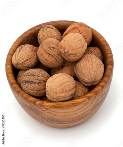 walnut in a wooden bowl