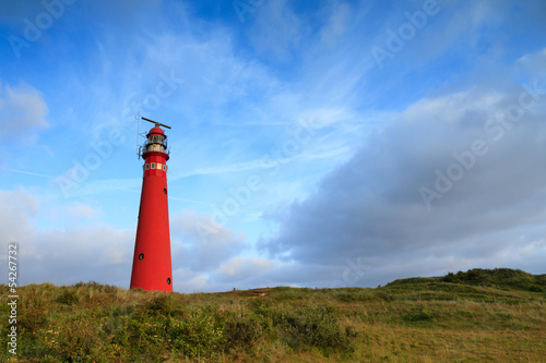 Lighthouse in the dunes photo