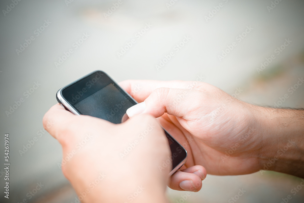 hand with smartphone hand with smartphone
