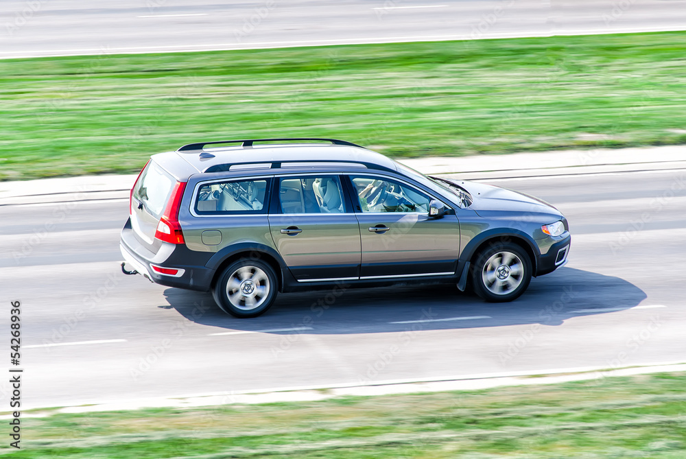 Fototapeta premium Family car driving on asphalt road