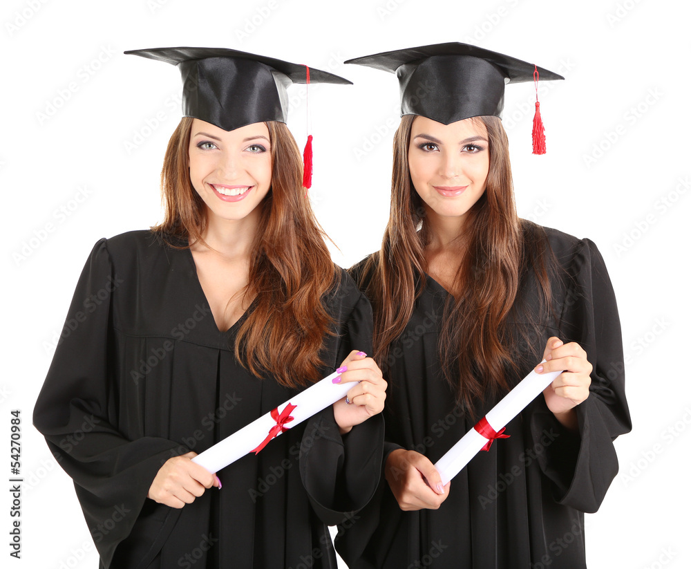 Two happy graduating students isolated on white Two happy graduating students isolated on white