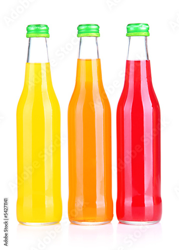 Bottles with tasty drink, isolated on white