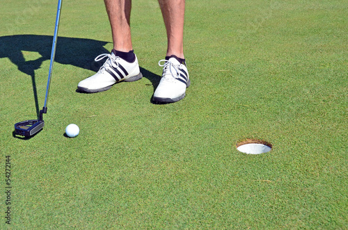 Golf ball golf shoes and stick