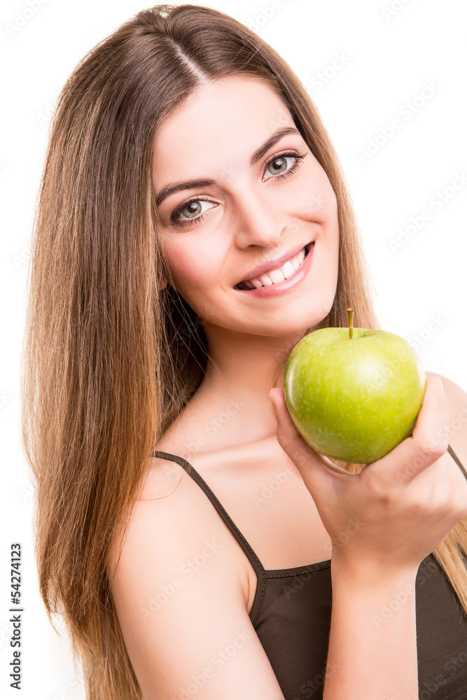 Portrait of a young woman eating green apple Portrait of a young woman eating green apple