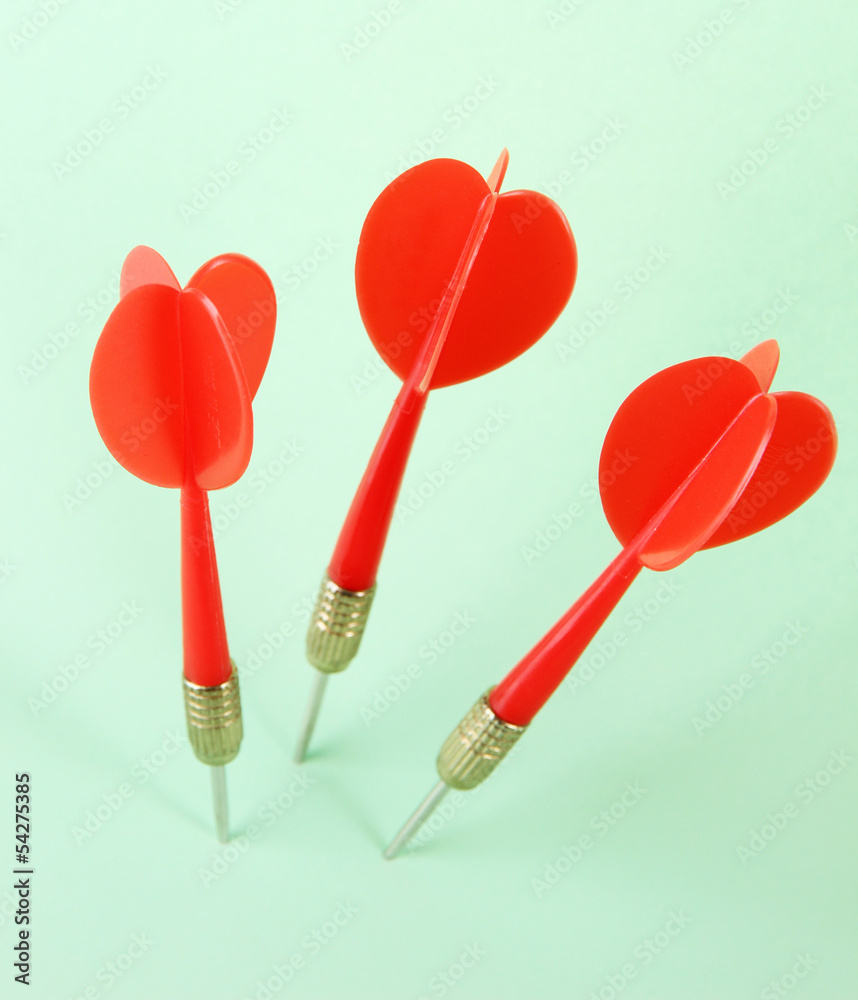 Darts on blue background Darts on blue background
