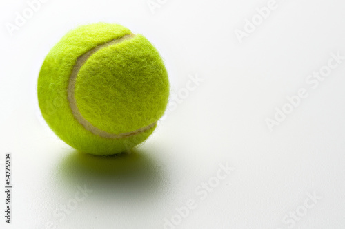 Yellow green tennis ball © photology1971