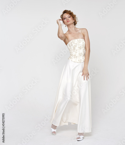 Beautiful blonde bride wearing wedding dress