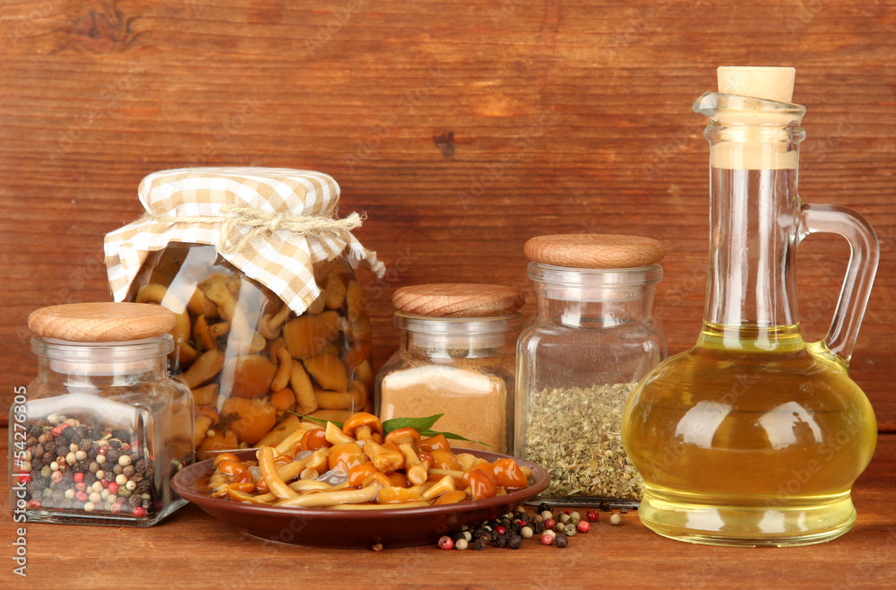 Composition of delicious marinated mushrooms, oil and spices Composition of delicious marinated mushrooms, oil and spices