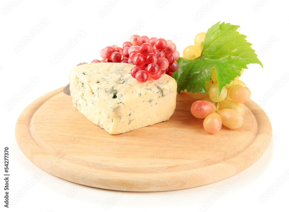 Tasty blue cheese and grape on cutting board, isolated on white Tasty blue cheese and grape on cutting board, isolated on white