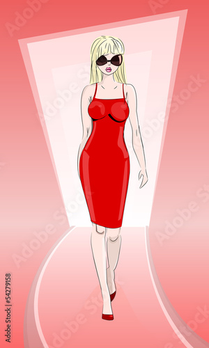 Model in red dress on catwalk