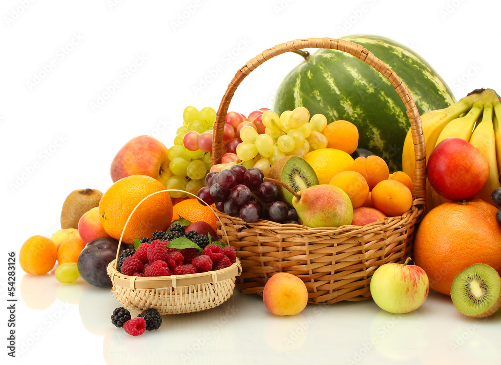 Assortment of exotic fruits and berries in baskets isolated Assortment of exotic fruits and berries in baskets isolated