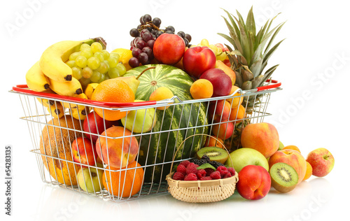 Assortment of exotic fruits in metal basket and berries