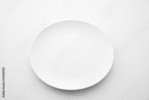 Porcelain plates on white background