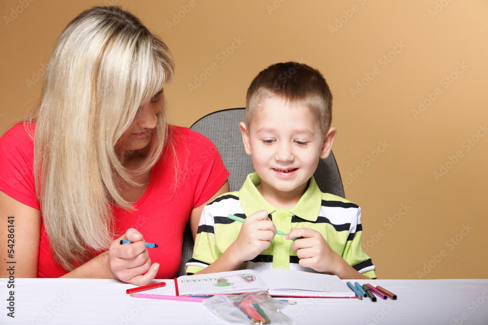 mother and son drawing together, daycare mother and son drawing together, daycare
