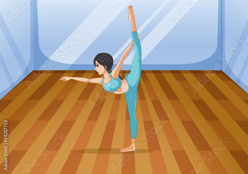 A girl performing yoga inside the studio