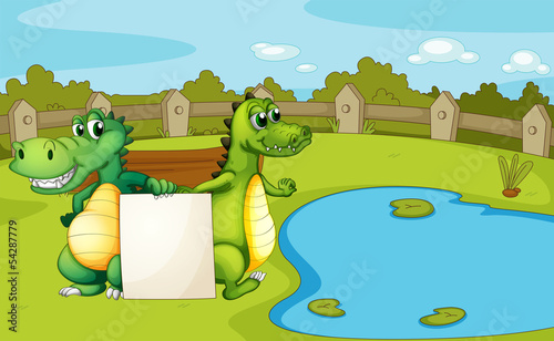 Crocodiles holding an empty banner