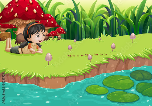 A girl at the riverbank near the red mushrooms