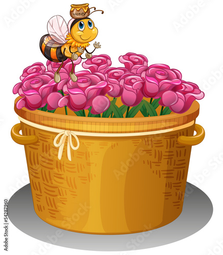 A bee with a pot of honey flying above the basket with flowers