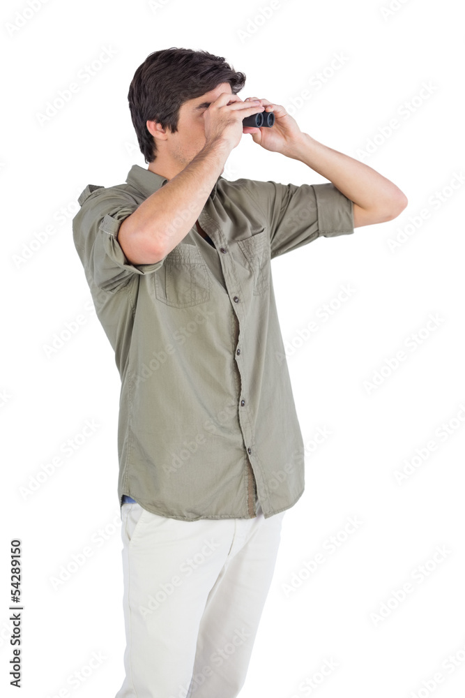 Man looking for something with binoculars Man looking for something with binoculars