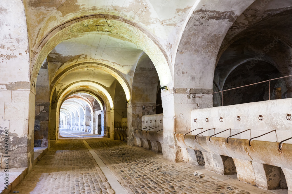 Stables in the dungeon of Sant Ferran Castle