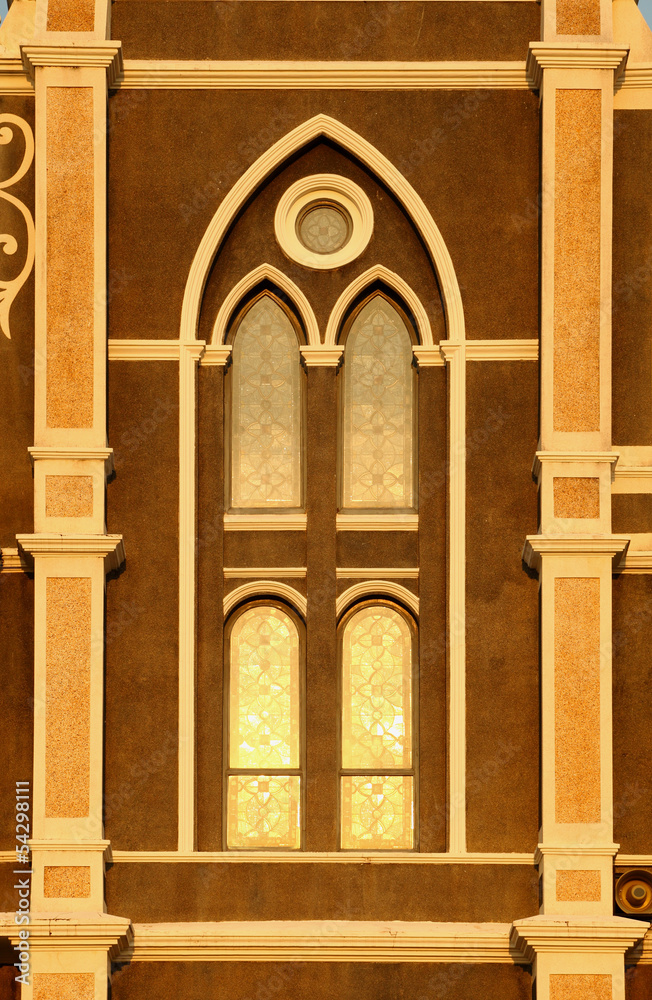 Naklejka premium window church evening sunlight gold chanthaburi province in thai