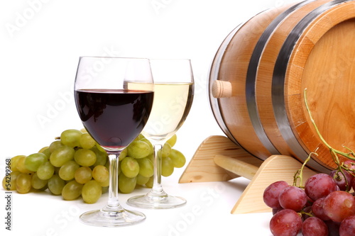 Two glasses of wine, barrel and grape photo