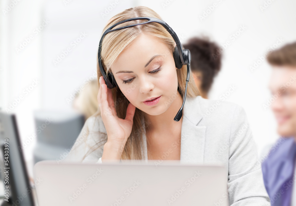 helpline operator with headphones in call centre helpline operator with headphones in call centre