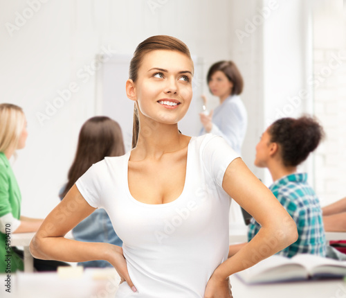 student girl in blank white t-shirt at school