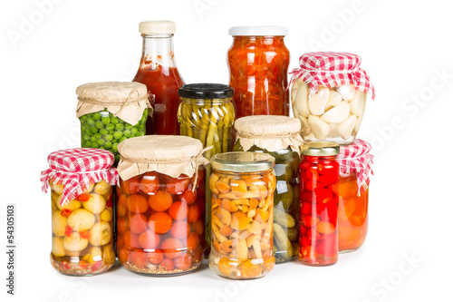 Marinated vegetables in glass jars