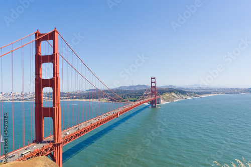 фотография Golden Gate Bridge  with San Francisco in the background.