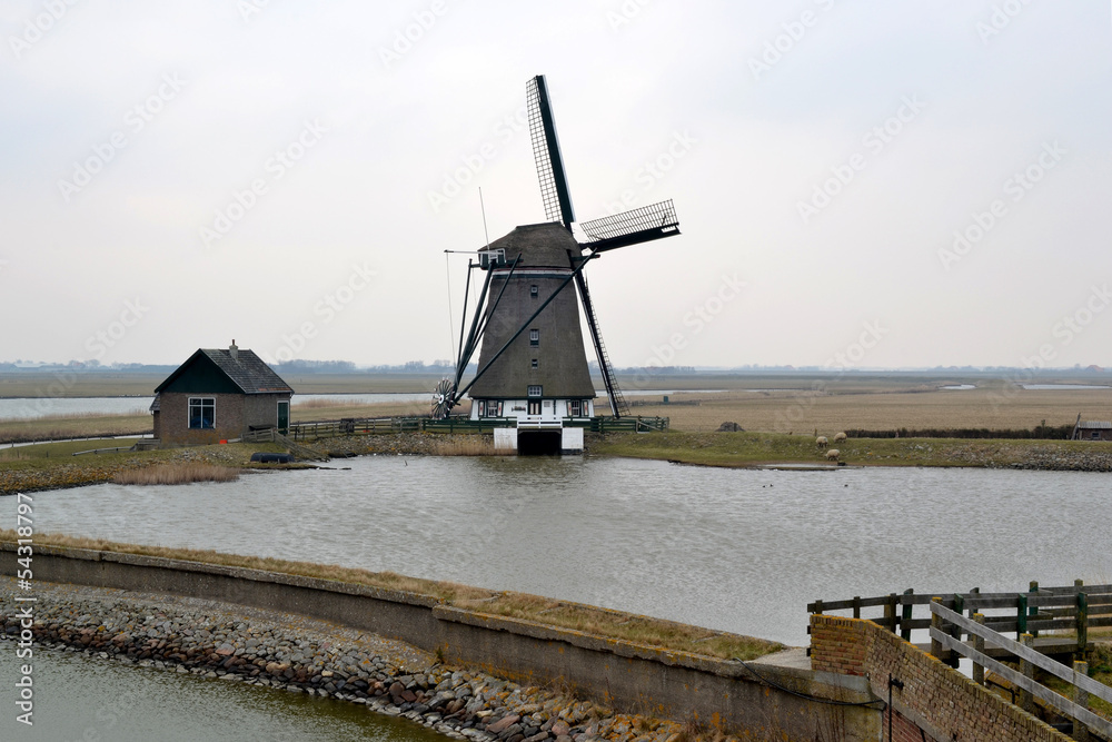 Mill along the Lancaster Deen on Texel, The Netherlands.