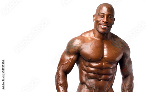 Strong bodybuilder man with perfect abs, shoulders,biceps, chest